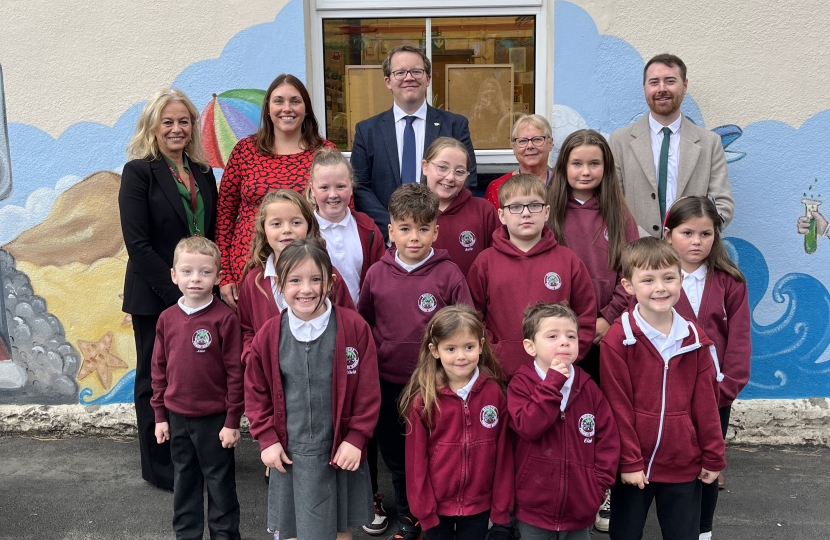 Joel James MS with children from Rhigos Primary School