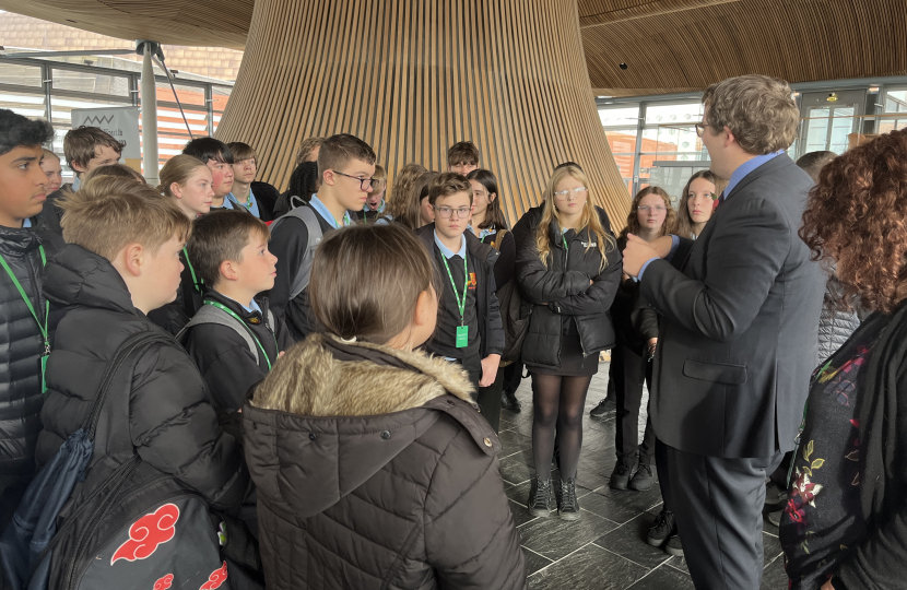 Joel speaking with students of his old school, Bryn Celynnog, in the Senedd