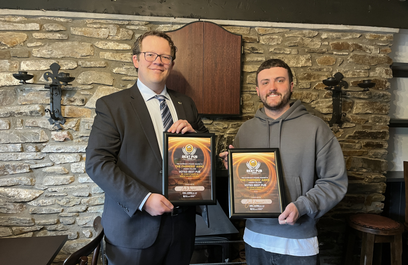 Joel James MS Presenting the Best Pub Award to the Farmers Arms.