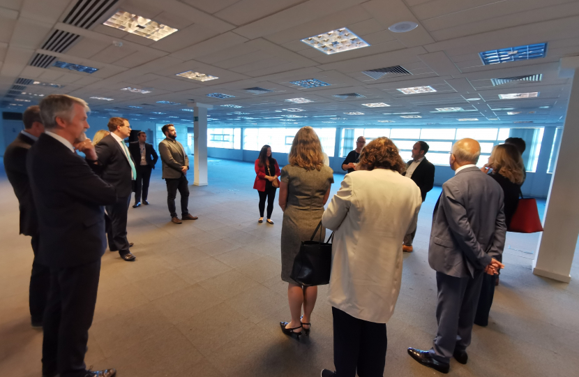 Joel and other Senedd members visiting the new medical facility