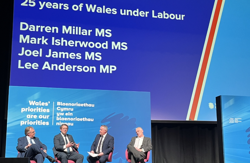 Joel James MS on the conference stage with (left to right) Mark Isherwood, Darren Millar and Lee Anderson 