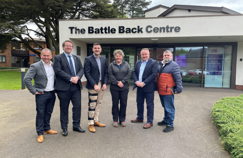 Joel James MS and Senedd Members outside the Battle Back Centre. 