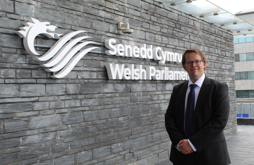 Joel James MS Outside Senedd. 