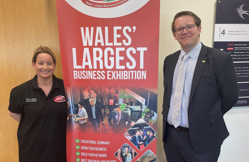 Joel James MS with the The Welsh Business Show Sign 