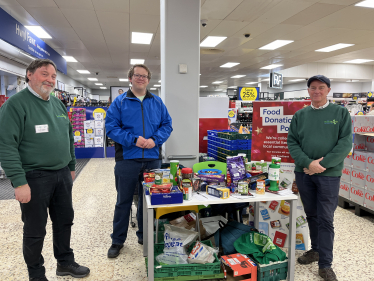 Joel with foodbank volunteers at Tesco in Barry