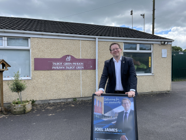 Joel James MS Outside Talbot Green Surgery. 