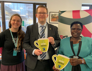 Joel James with Jenipher Sambuzi at Fair Trade event in Senedd canteen 