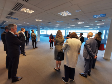 Joel and other Senedd members visiting the new medical facility