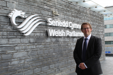 Joel James MS outside the Senedd